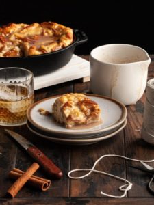 cropped-Bread-Pudding-with-Bourbon-Sauce-Slice-of-Bread-Pudding-Smothered-in-Sauce.jpg