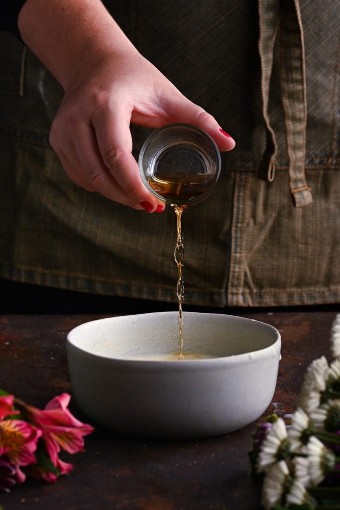 adding brandy to sauce for bread pudding