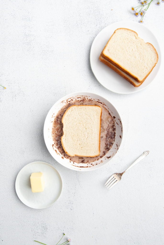 dipping bread in flavored egg whites