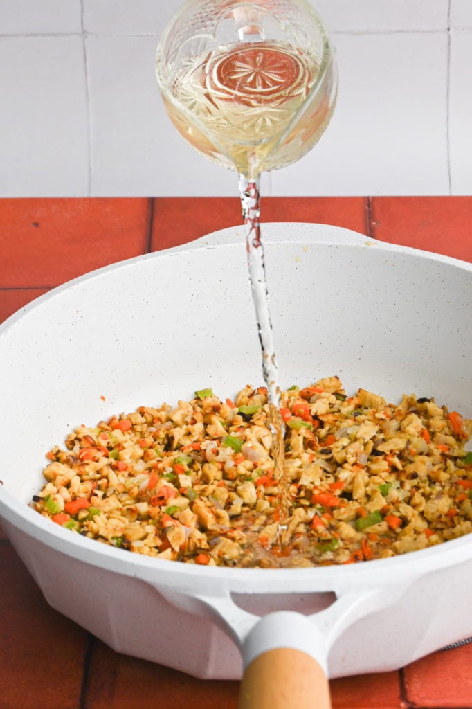 adding white wine to tempeh bolognese