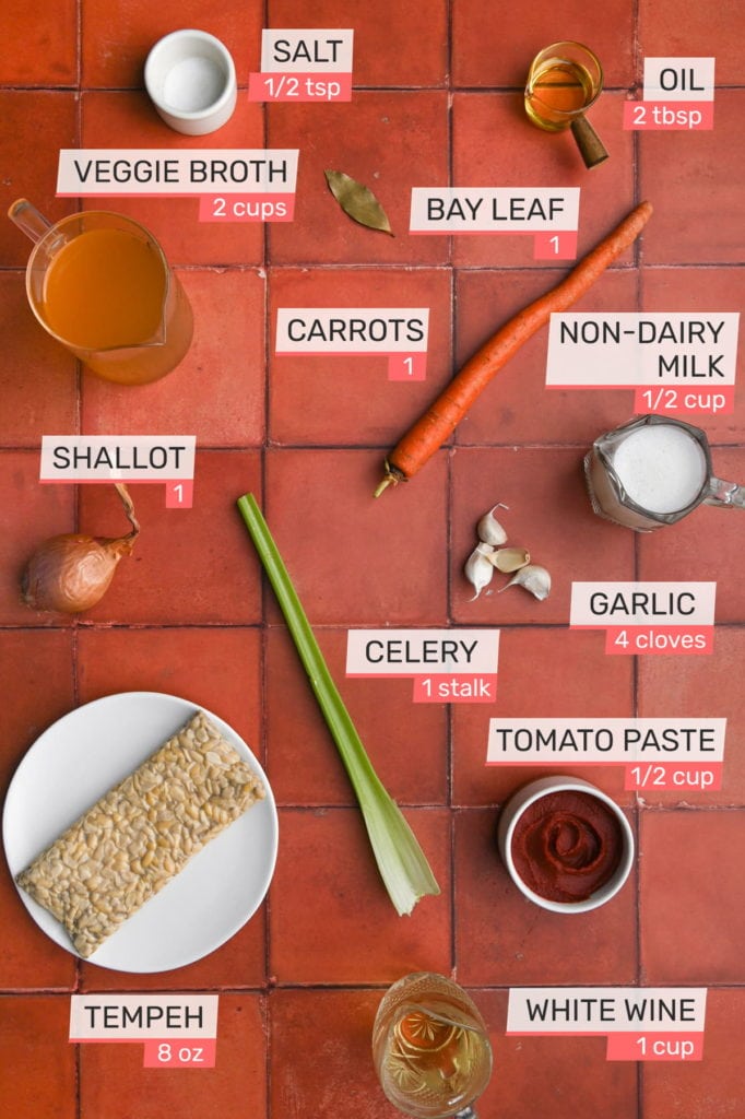 salt, olive oil, veggie broth, bay leaf, carrot, non-dairy milk, shallot, celery, garlic, tomato paste, white wine, tempeh