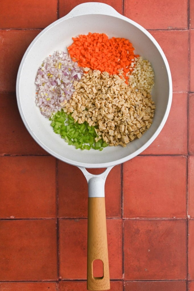 finely diced shallot, carrot, garlic, tempeh, and celery