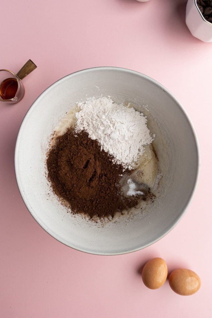 adding flour, cocoa powder, and salt to brownie batter