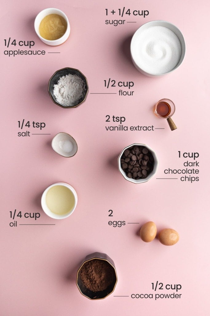 applesauce, granulated sugar, all-purpose flour, dark chocolate chips, oil, eggs, and unsweetened dark cocoa powder