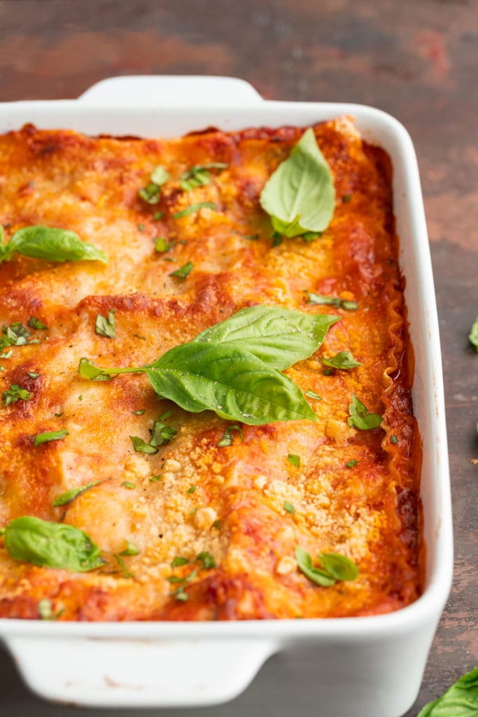 baked meatless lasagna garnished with basil