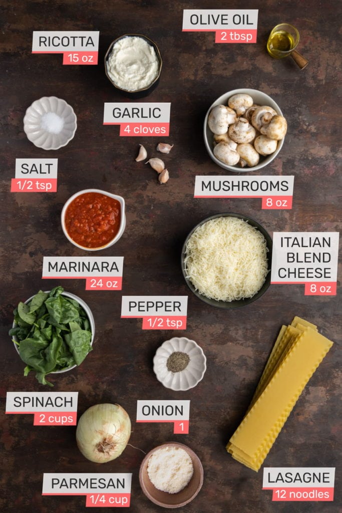ricotta, olive oil, salt, garlic, mushrooms, marinara, Italian blend cheese, spinach, pepper, lasagne noodles, onion, parmesan