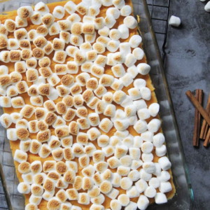 Overhead view of 5-Ingredient Maple Sweet Potato Casserole in a casserole dish on a cooling rack