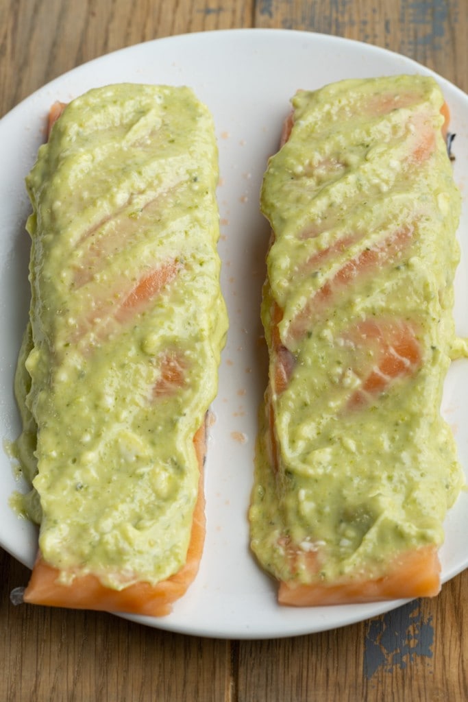 coating salmon with pesto butter