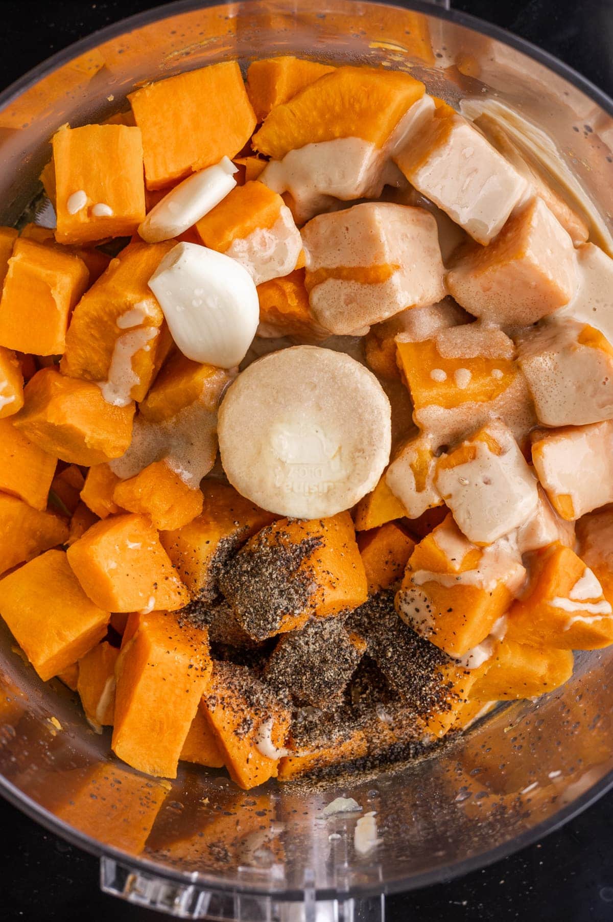 all ingredients for sweet potato hummus in a food processor