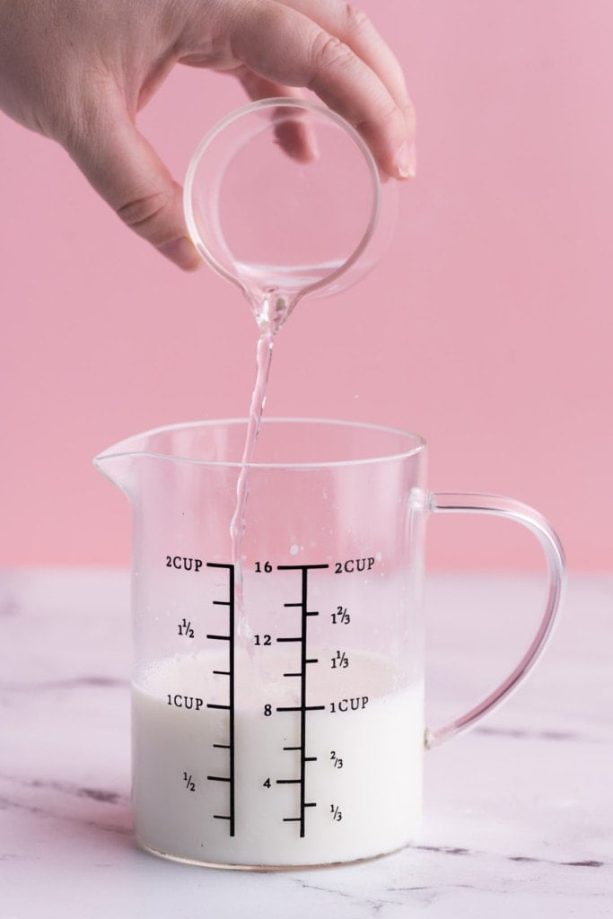 Making buttermilk at home by mixing milk and distilled white vinegar