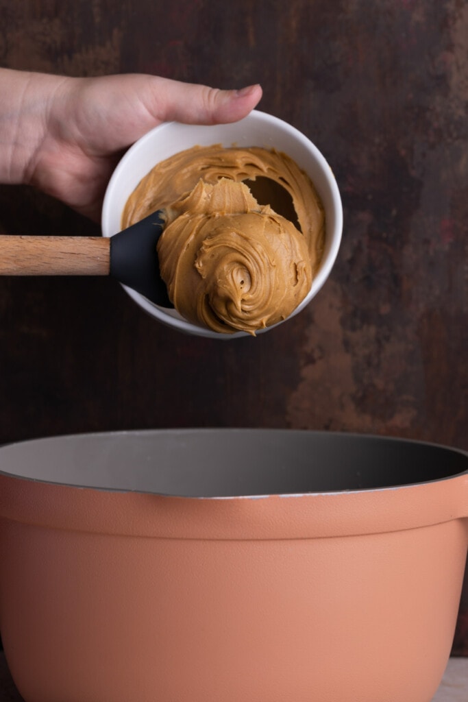 Adding peanut butter to pot after removing from heat