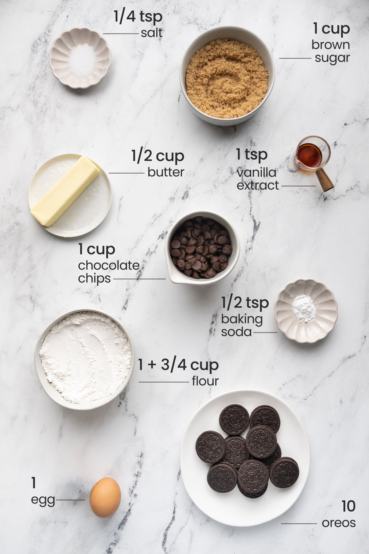 Oreo Chocolate Chip Cookies Ingredients - Salt, brown sugar, unsalted butter, chocolate chips, vanilla extract, chocolate chips, all-purpose flour, eggs, Oreos, and baking soda