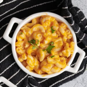 Overhead view of vegan truffle mac and cheese in a white soup bowl