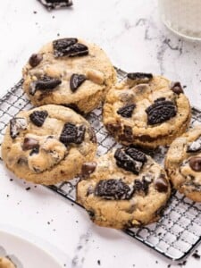 Oreo Chocolate Chip Cookies with two glasses of milk