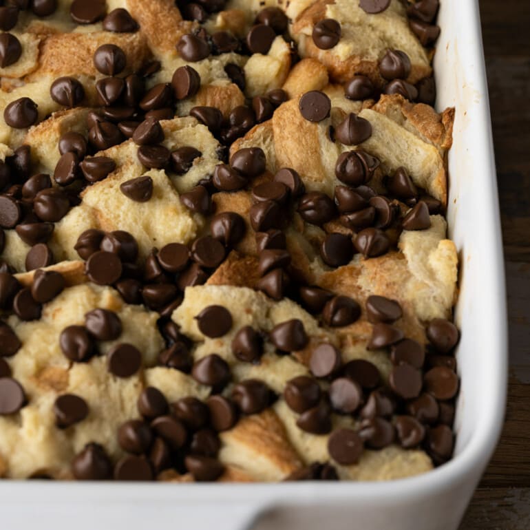 Chocolate Chip Bread Pudding close in a white baking dish
