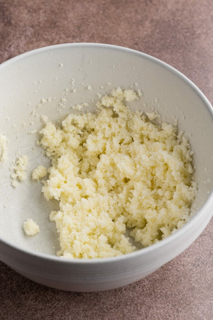 Butter and sugar creamed together in a large mixing bowl