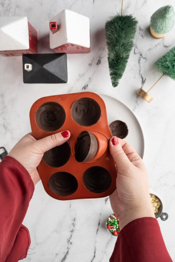 Removing chocolate spheres from molds