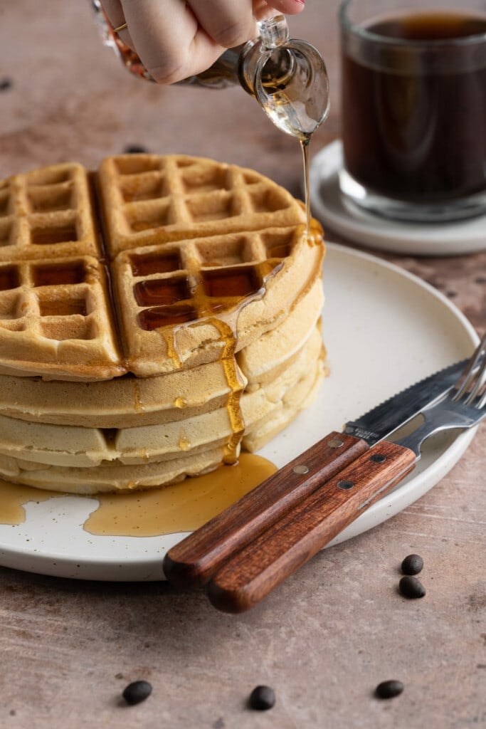 Close up of maple syrup dripping down Dairy-Free Waffles