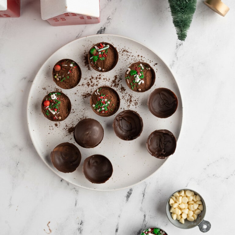 Fill chocolate spheres with hot cocoa mix