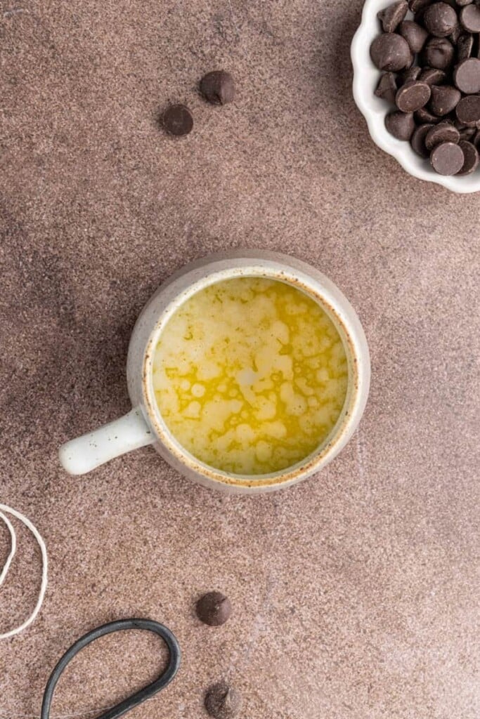 Melting butter in microwave-safe mug