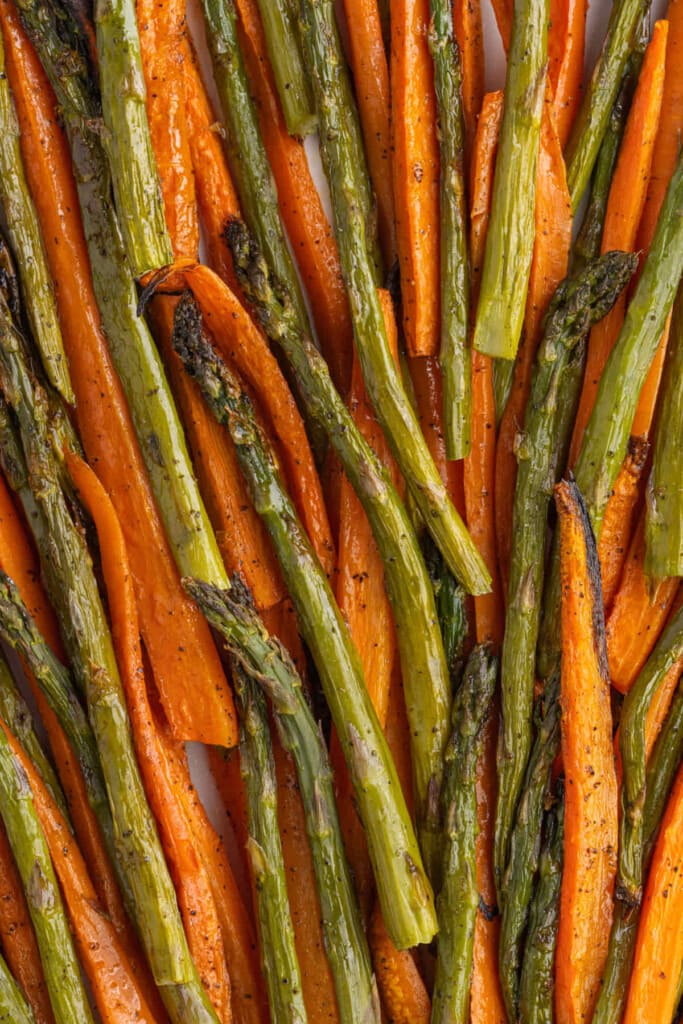 Close up of roasted carrots and asparagus