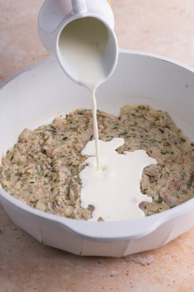 Adding cream to shallot sauce