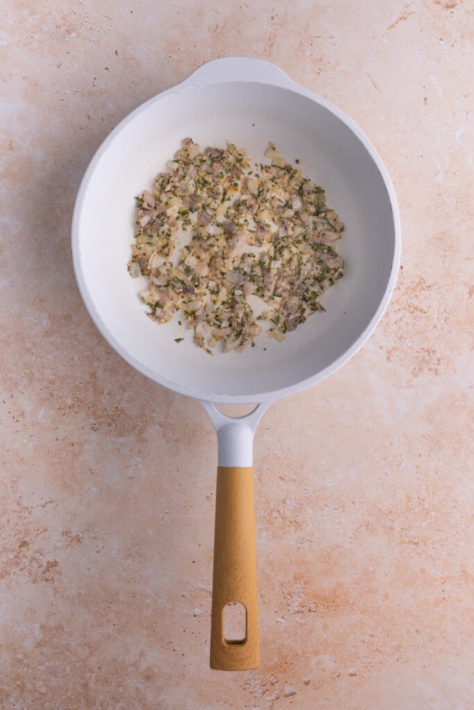 Cooking down shallots, garlic, and rosemary