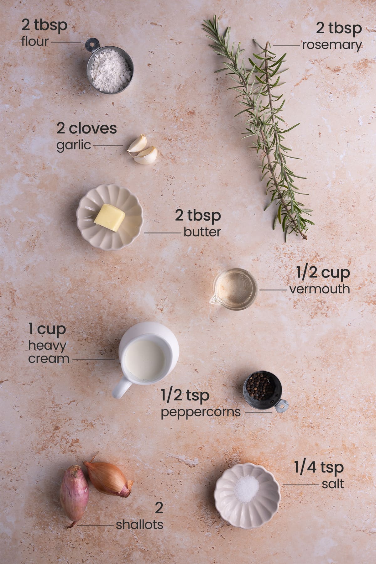 ingredients for shallot cream sauce - flour, rosemary, garlic, butter, vermouth, heavy cream, peppercorns, salt, shallots