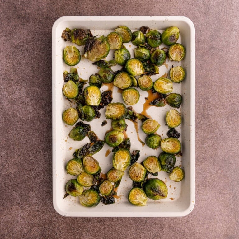 Roasted brussels sprouts tossed in maple syrup and balsamic vinegar
