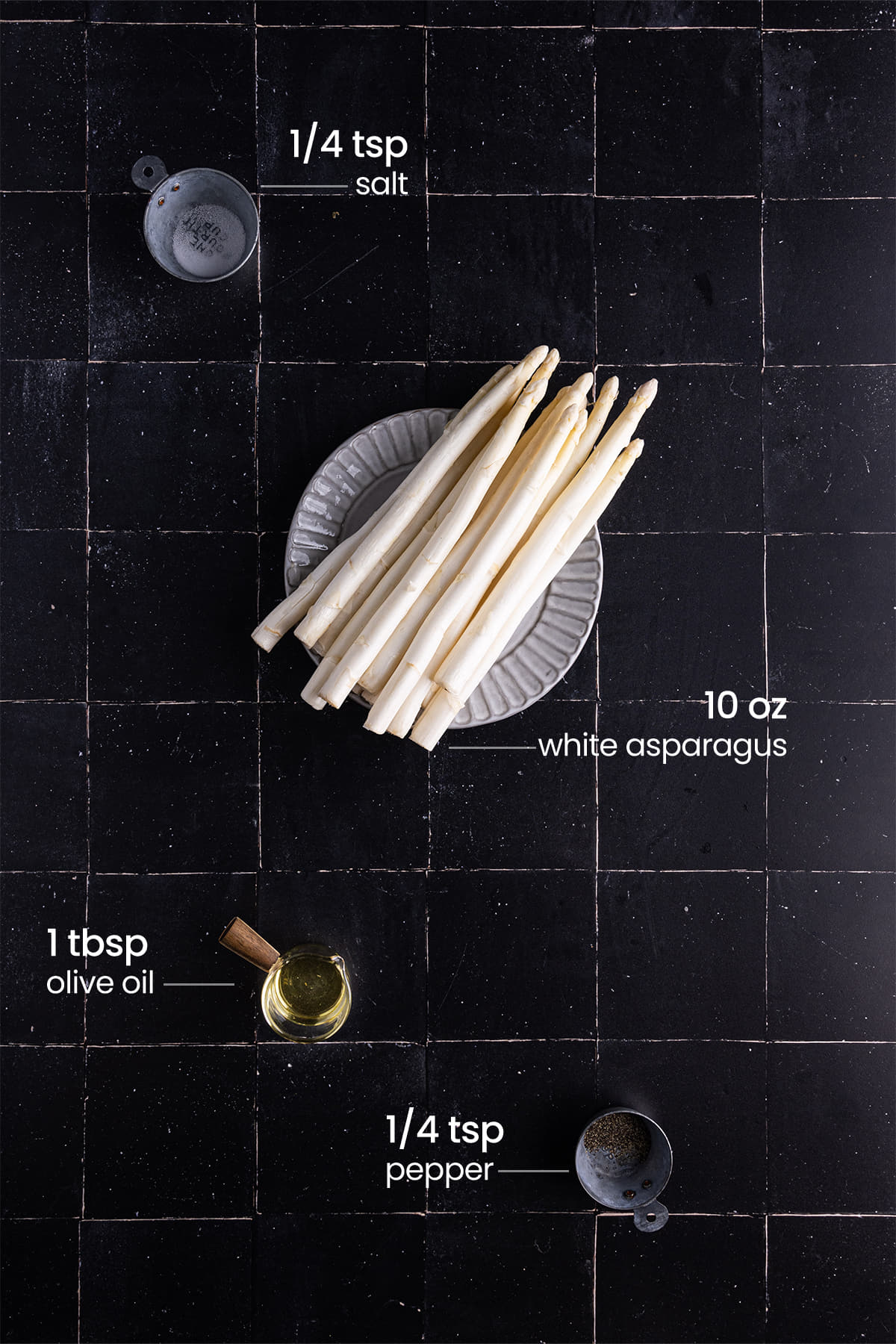 ingredients for the best white asparagus recipe - salt, pepper, olive oil, white asparagus