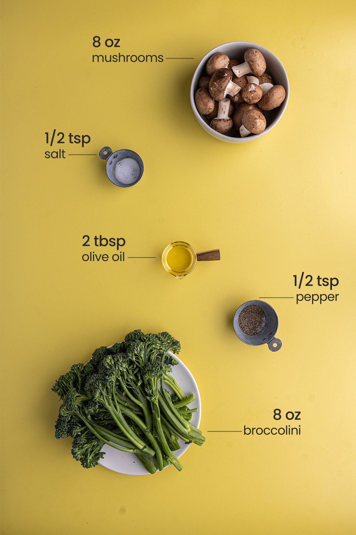 ingredients needed for sauteed broccolini and mushrooms - salt, mushrooms, olive oil, pepper, broccolini