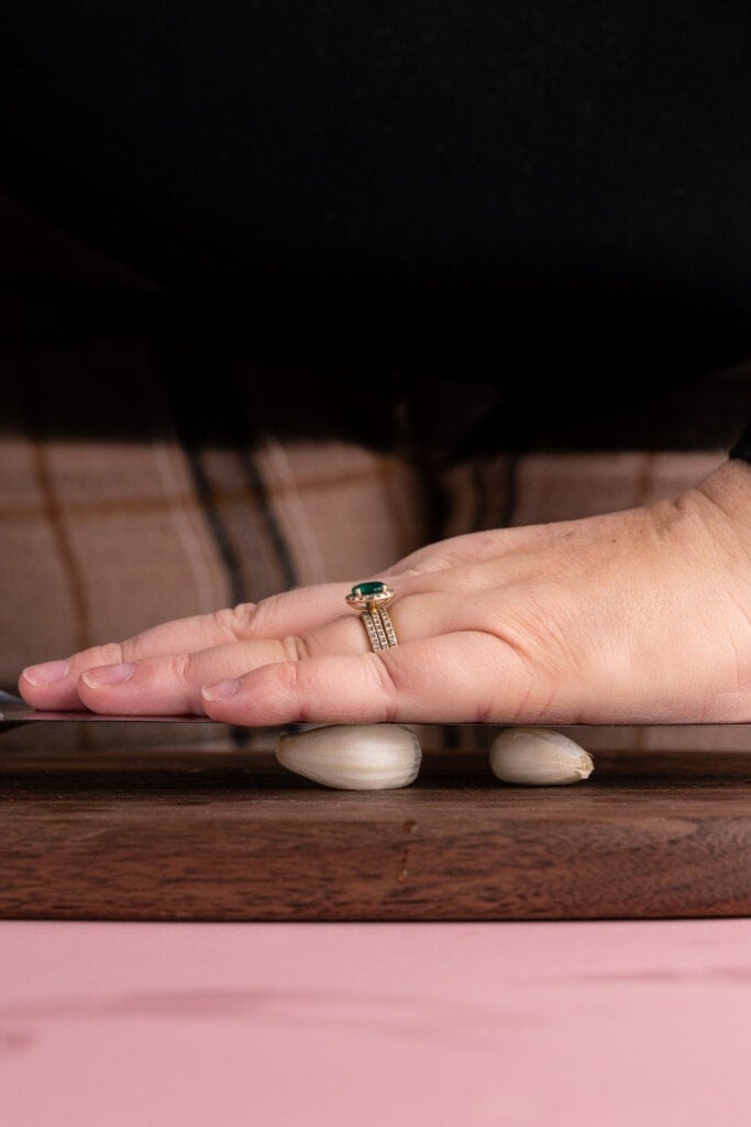 Crushing garlic to make it easier to peel