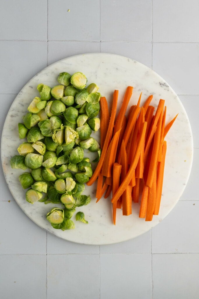 Carrots and brussels sprouts ready to roast