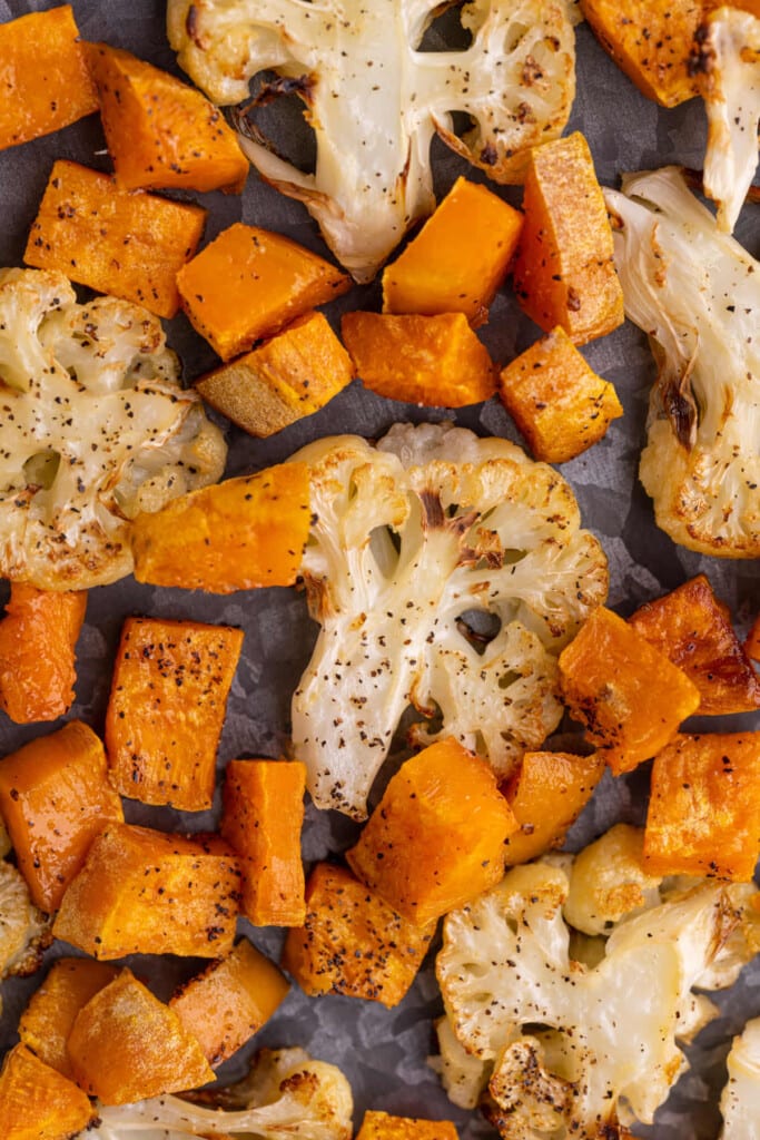 Close up of roasted cauliflower and sweet potatoes 