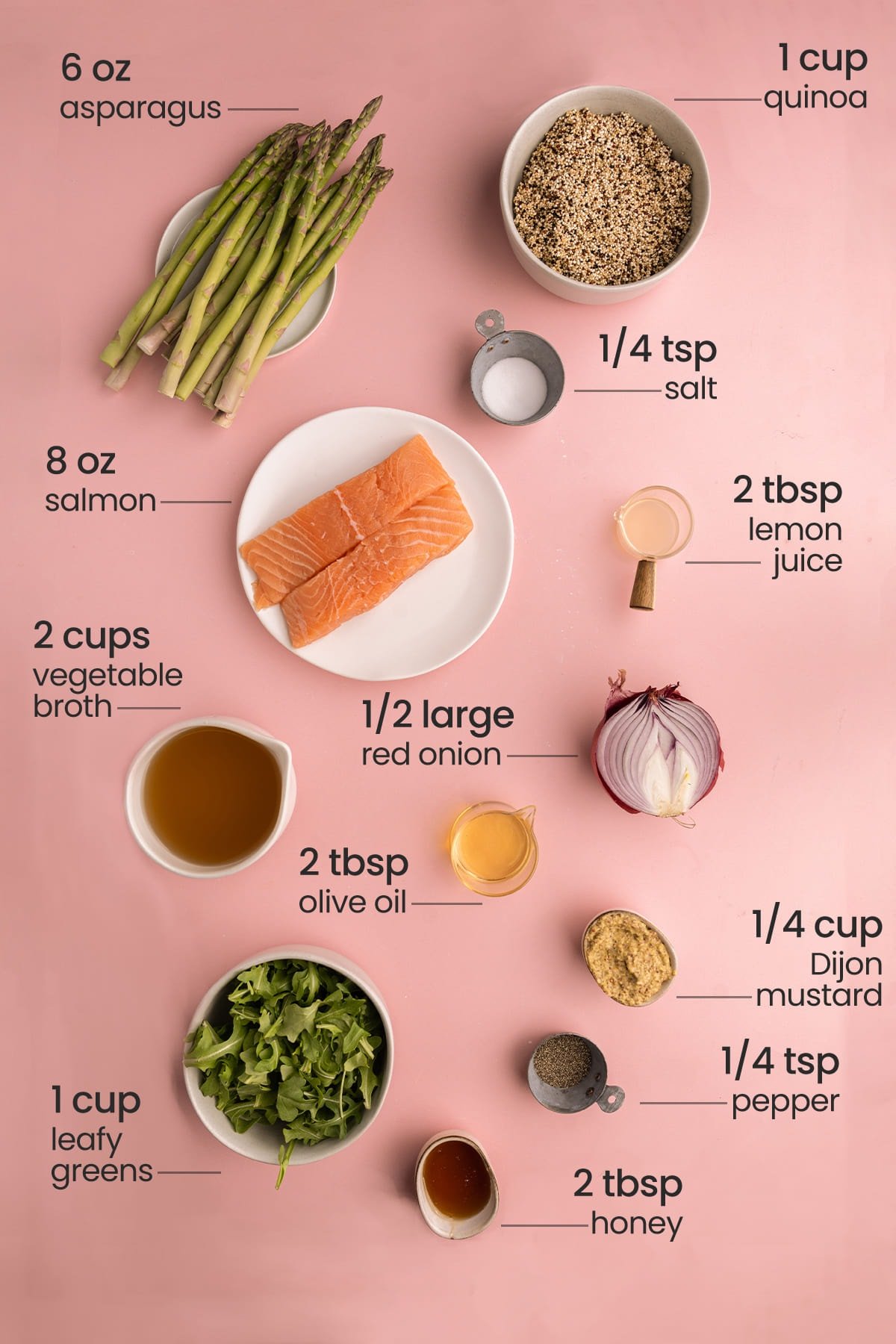 Salmon Quinoa Bowl ingredients including asparagus, quinoa, salt, salmon, olive oil, vegetable broth, red onion, lemon juice, Dijon mustard, pepper, and arugula
