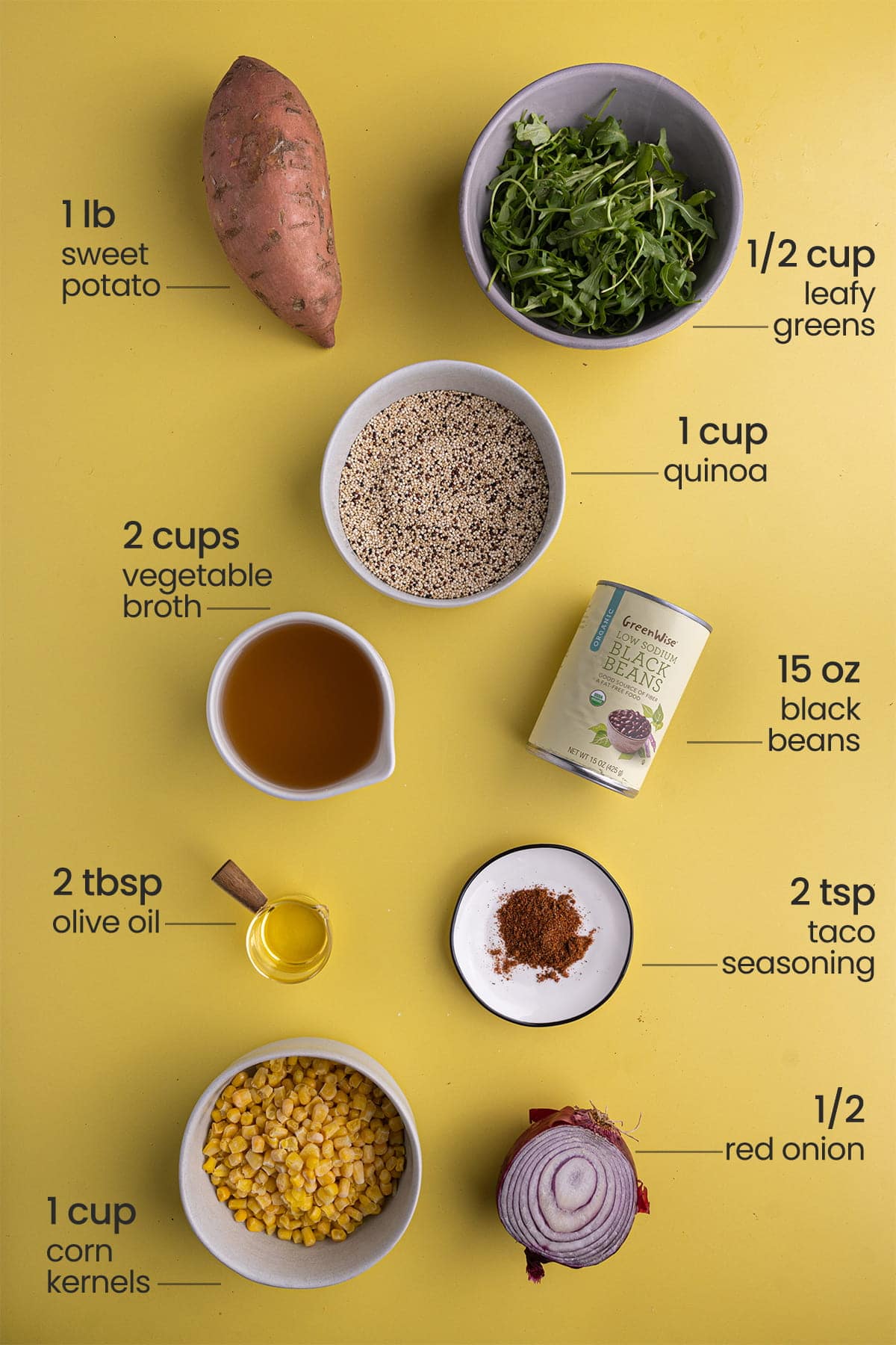ingredients for sweet potato quinoa bowl - leafy greens, sweet potato, quinoa, vegetable broth, black beans, olive oil, taco seasoning, corn kernels, red onion