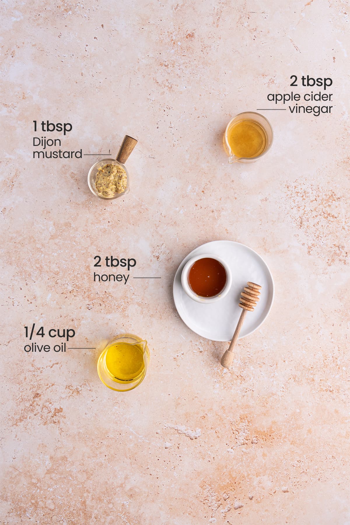 ingredients for honey Dijon vinaigrette - apple cider vinegar, Dijon mustard, honey, olive oil