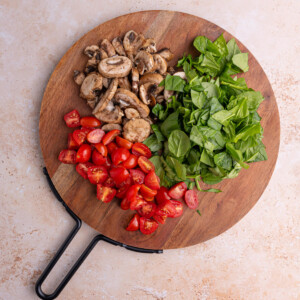 chopped spinach sliced mushrooms and halved grape tomatoes