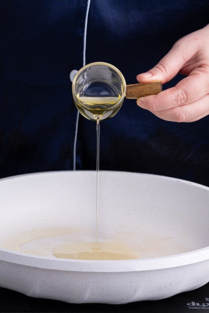 Getting oil hot in a pan before frying breakfast vegetables