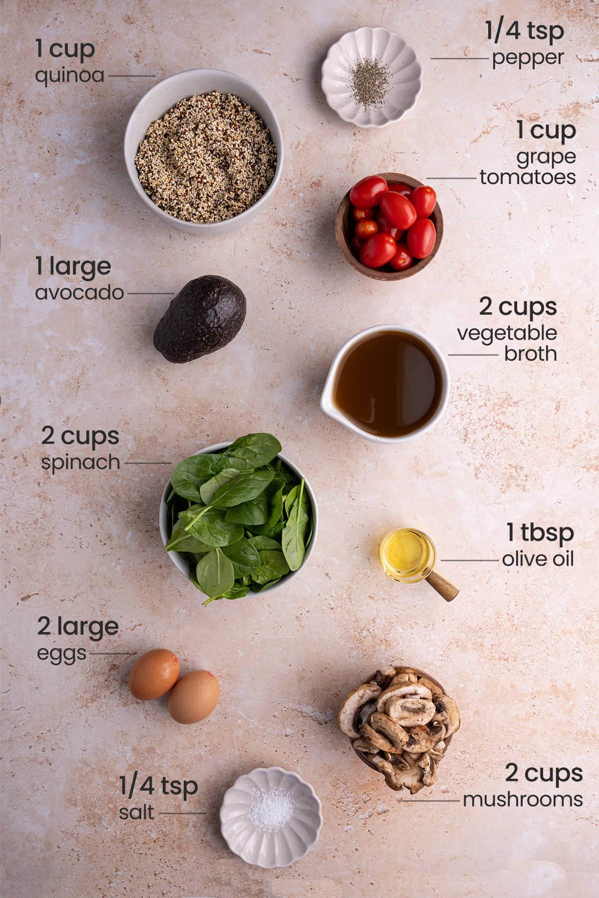 ingredients for quinoa breakfast bowl - pepper, grape tomatoes, quinoa, avocado, vegetable broth, spinach, olive oil, eggs, salt, mushrooms