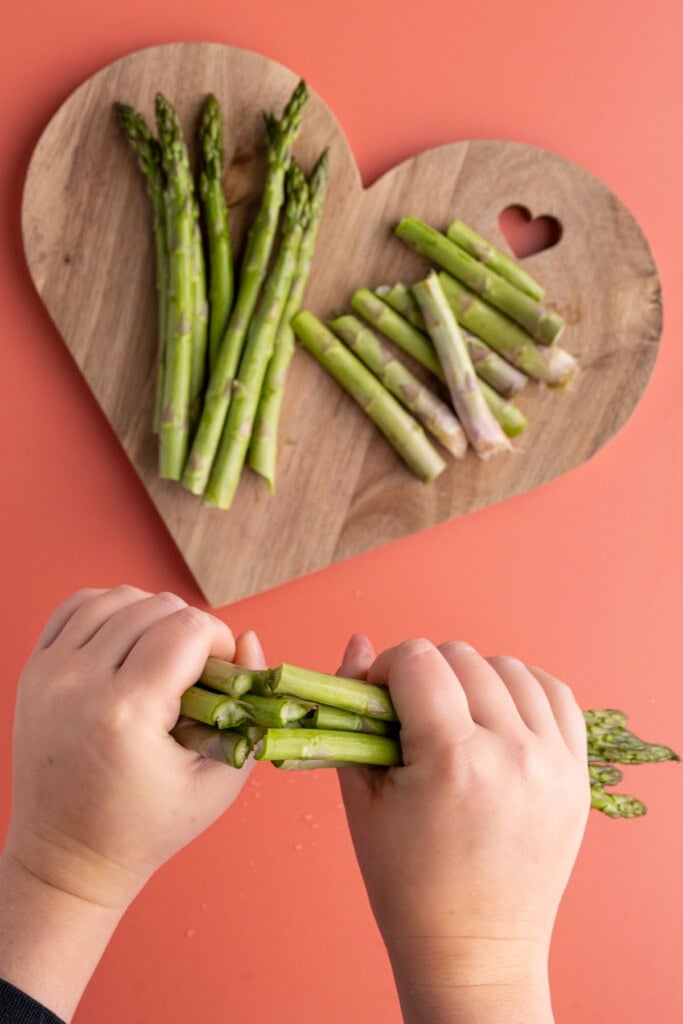 Breaking off ends of asparagus