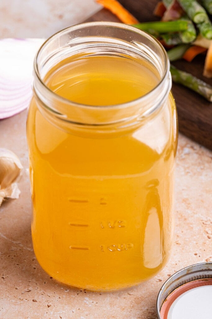 Close up of Vegetable Scrap Broth in glass jar