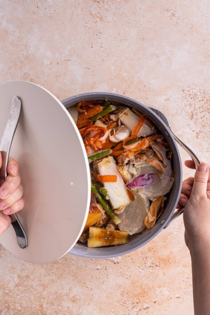 Covering veggie broth to simmer