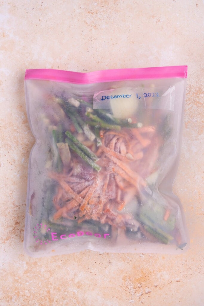 Freezer bag full of veggie scraps