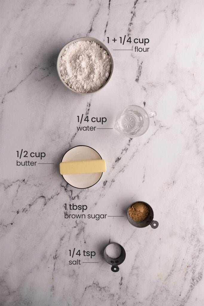 Ingredients for asparagus quiche crust - flour, water, butter, salt, brown sugar.