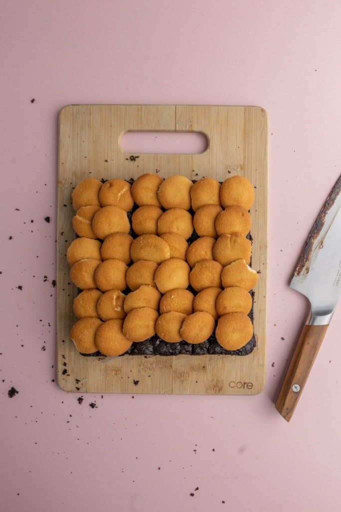 Layering vanilla wafers on brownies