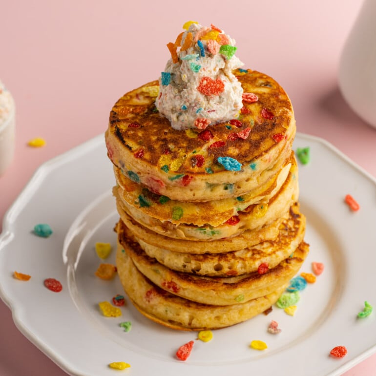 Fluffy Fruity Pebbles Pancakes with Cereal Milk Whipped Cream