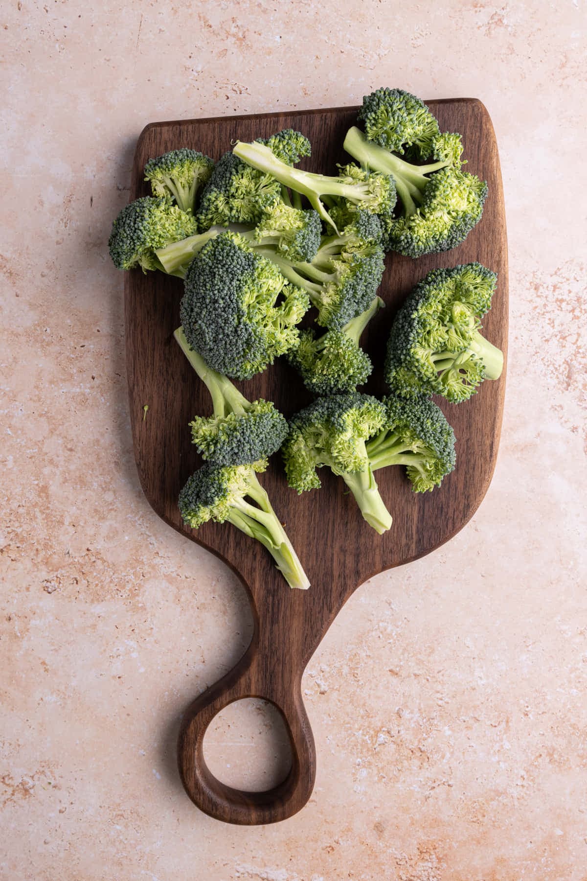 Broccoli that has been cut off the stems and chopped into roughly equal pieces