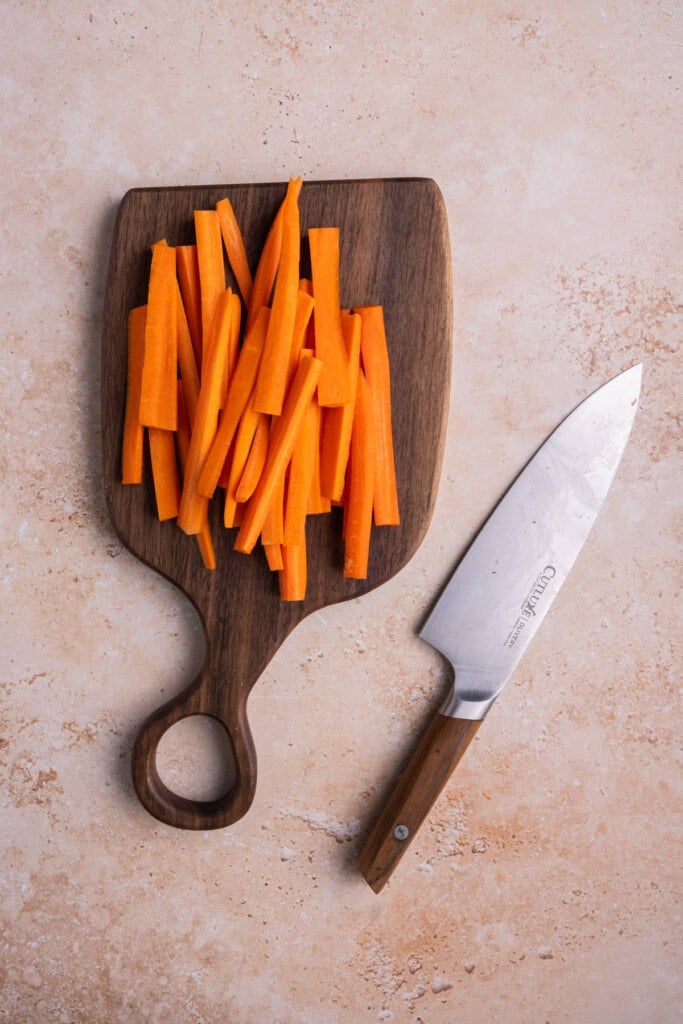 Peeled and sliced carrots ready for roasting