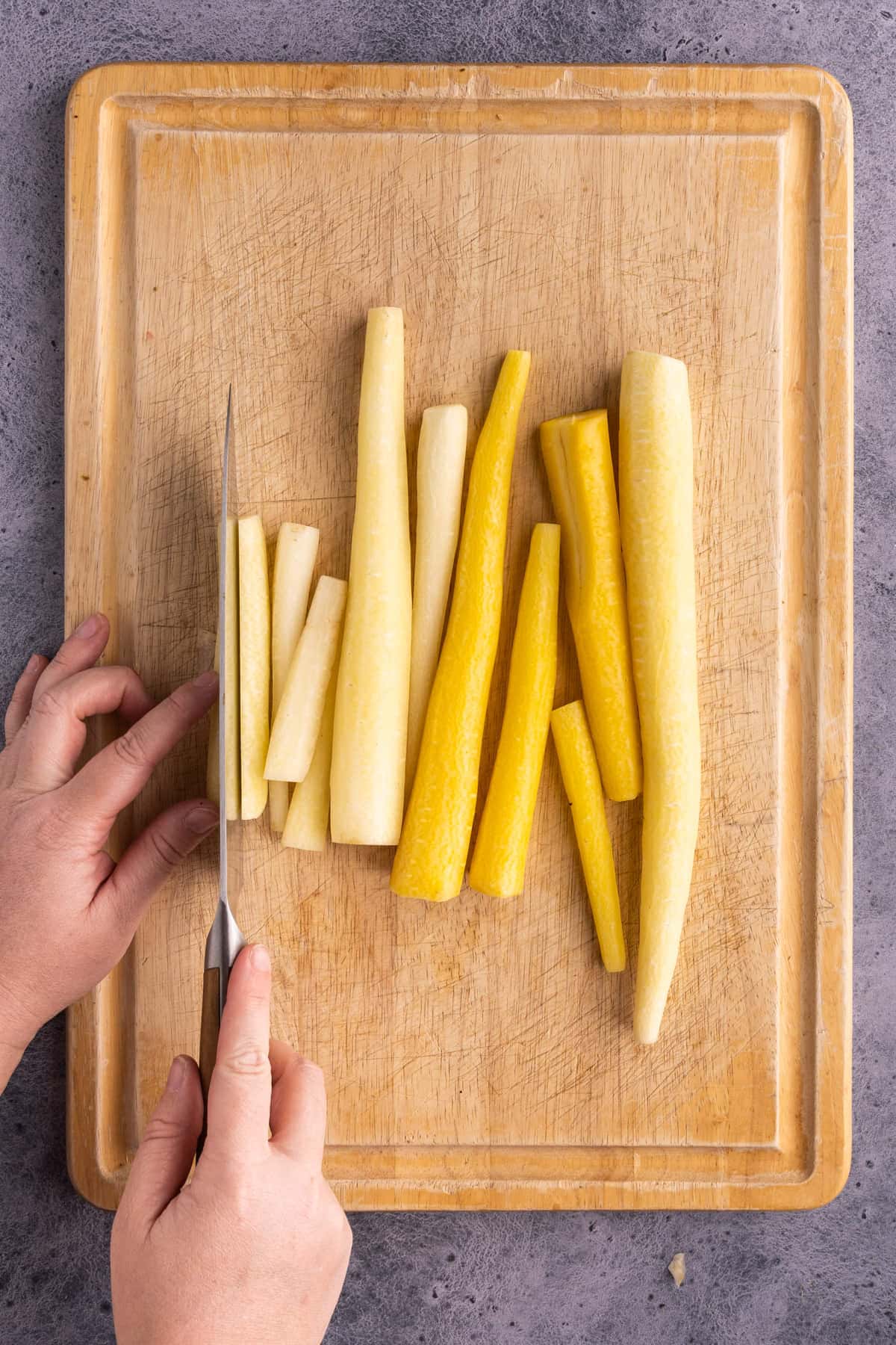 Slicing white carrots